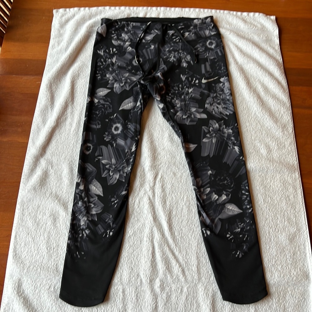 Nike womens running tights size medium dri fit / unique floral pattern